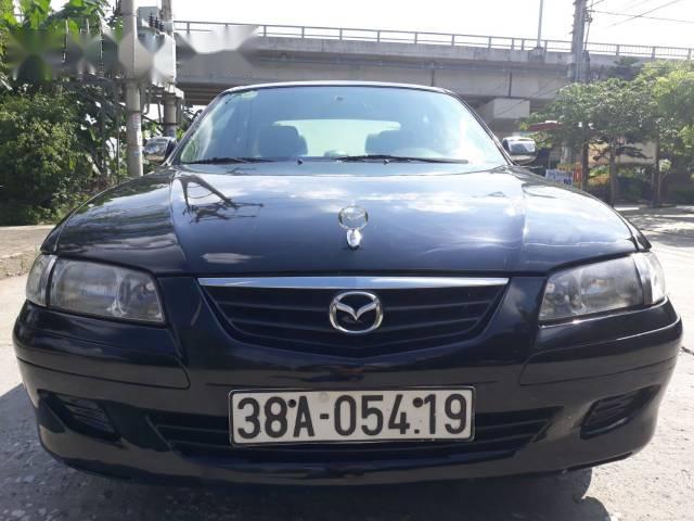 Bán ô tô Mazda 626 đời 2001, màu đen chính chủ