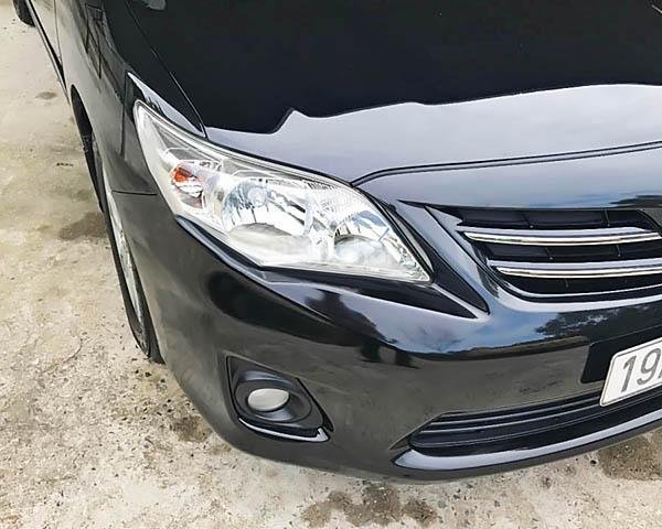 Bán Toyota Corolla altis 1.8G AT đời 2010, màu đen số tự động