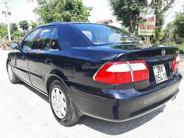 Bán Mazda 626 SX đời 2001, màu đen chính chủ