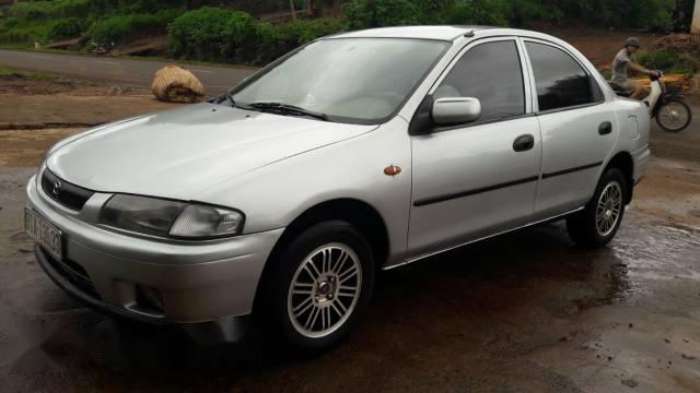 Bán Mazda 323 sản xuất 2002, màu bạc, xe nhập xe gia đình