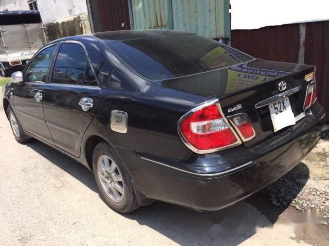 Cần bán xe Toyota Camry 2.4G đời 2004, màu đen, 385 triệu