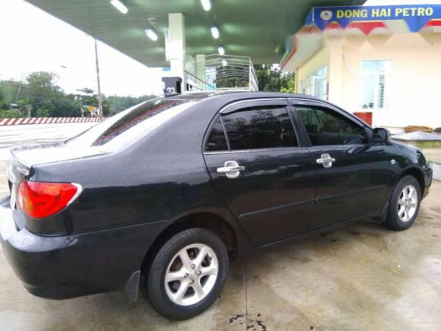 Bán Toyota Corolla altis đời 2003, màu đen 