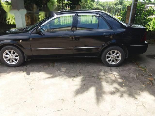 Bán xe Ford Laser đời 2003, màu đen