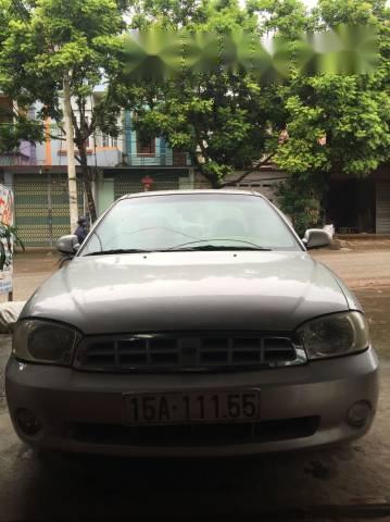 Cần bán gấp Kia Spectra năm 2003, màu bạc