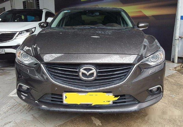 Cần bán xe Mazda 6 2.0AT đời 2016, màu nâu xe gia đình