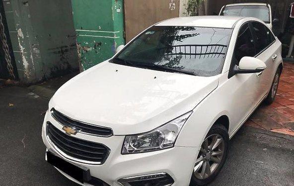 Bán xe Chevrolet Cruze LT đời 2016, màu trắng số sàn