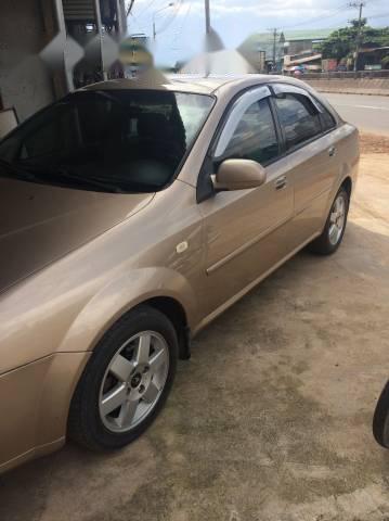 Bán xe Daewoo Lacetti đời 2004, màu vàng