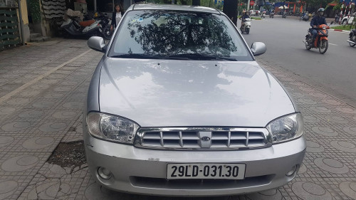 Cần bán gấp Kia Spectra 1.6 MT đời 2004, màu bạc