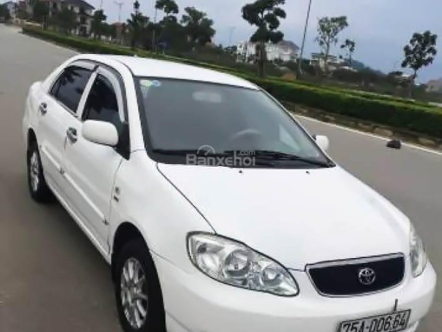 Cần bán xe Toyota Corolla J 1.3 MT đời 2003, màu trắng chính chủ