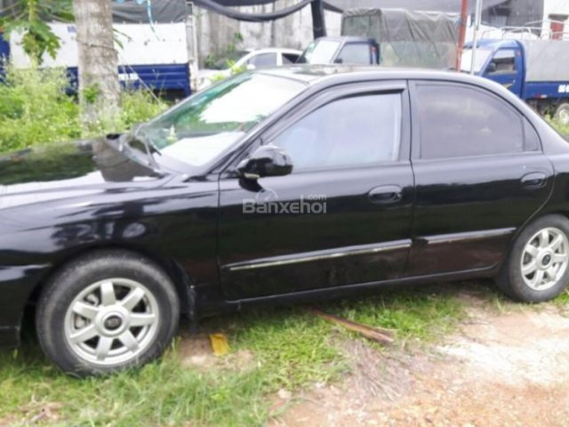 Bán xe Kia Spectra đời 2004, màu đen, nhập khẩu nguyên chiếc 130tr