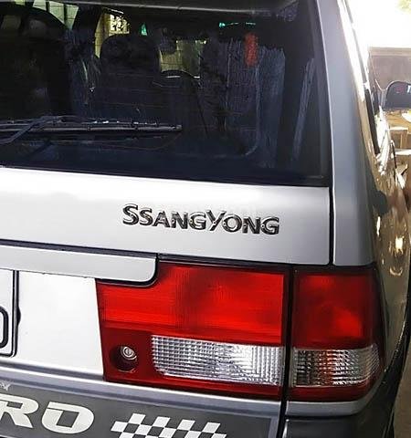 Cần bán xe Ssangyong Musso 2.3 AT 2005, màu bạc