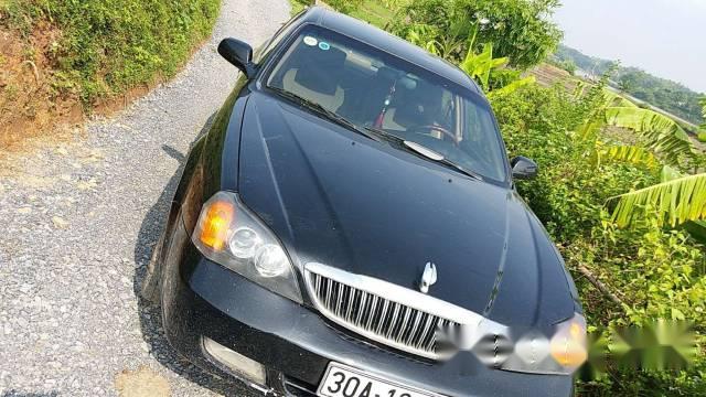 Bán xe Daewoo Magnus đời 2004, màu đen số tự động, 135 triệu