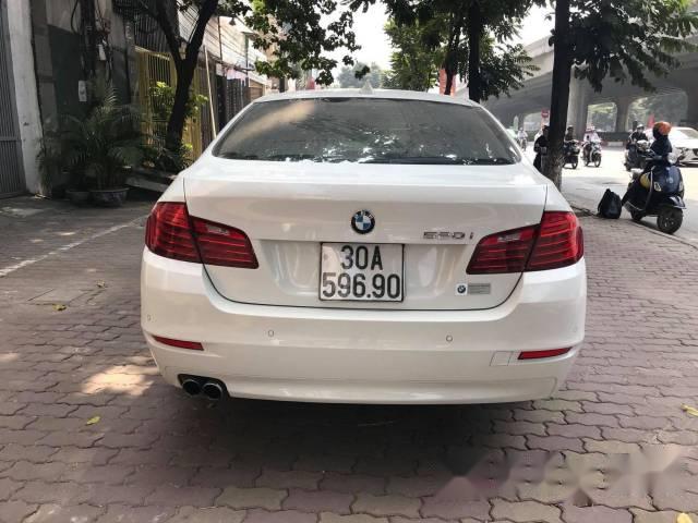 Cần bán xe BMW 5 Series 520i đời 2014, màu trắng chính chủ