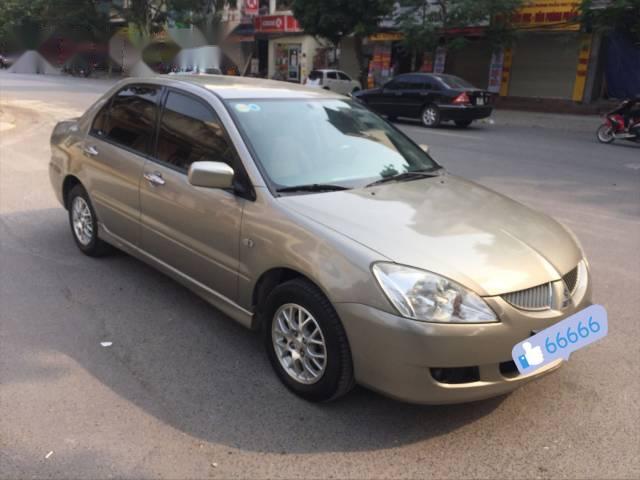 Bán ô tô Mitsubishi Lancer năm 2005, màu vàng 