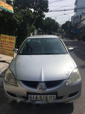 Cần bán Mitsubishi Lancer AT đời 2004, màu bạc