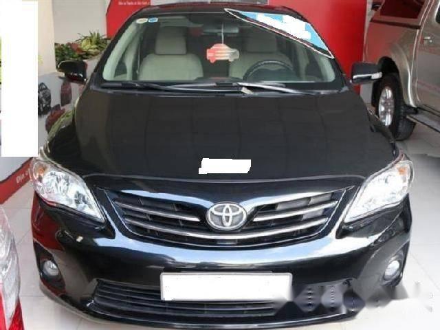 Chính chủ bán Toyota Corolla altis năm 2011, màu đen