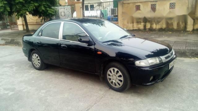 Bán Mazda 323 năm 2001, màu đen chính chủ, giá tốt