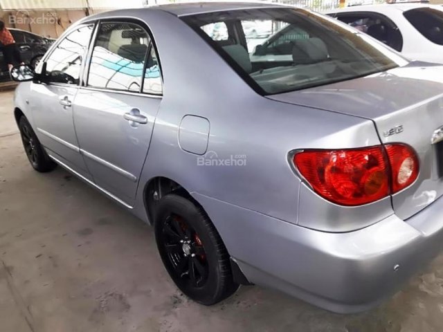 Bán Toyota Corolla Altis đời 2002, màu bạc, 248 triệu