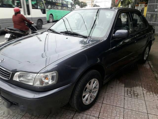 Cần bán Toyota Corolla đời 2001, màu xám như mới