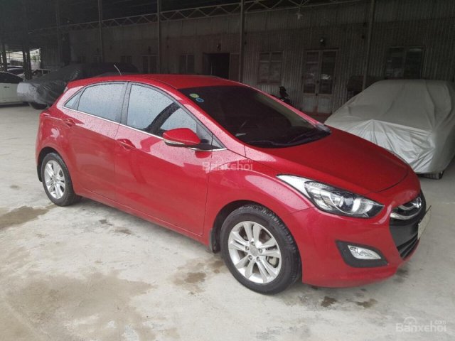 Bán Hyundai I30 nhập Hàn Quốc 2014 màu đỏ mẫu mới, biển Sài Gòn, số tự động