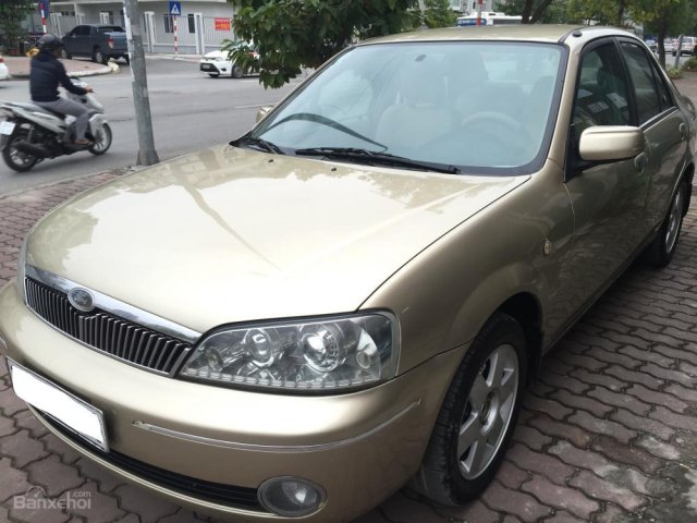 Bán ô tô Ford Laser 1.8MT năm 2003, màu vàng cát, giá chỉ 195 triệu