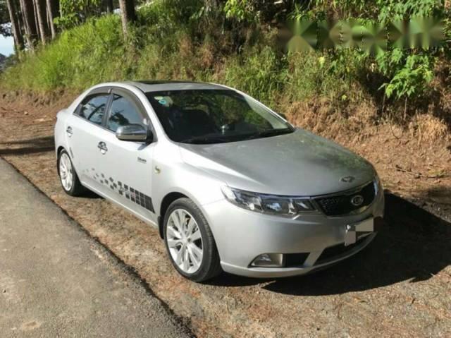 Bán xe cũ Kia Forte đời 2011, màu bạc số tự động, giá 396tr