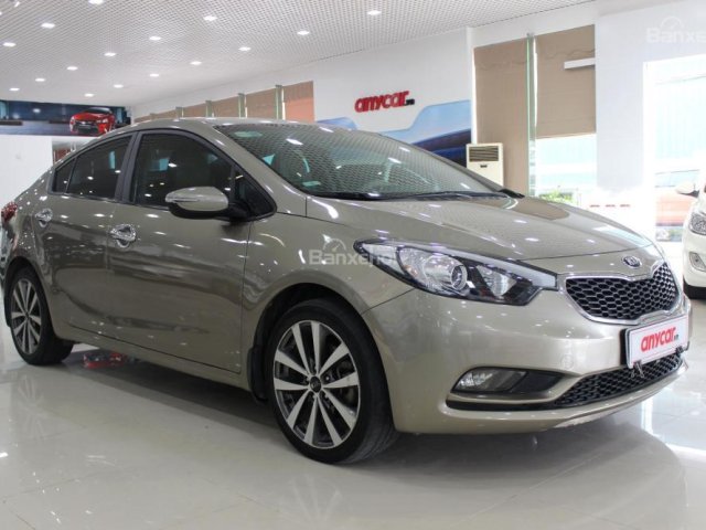 Bán xe Kia K3 1.6MT sản xuất 2014, màu vàng, 474 triệu