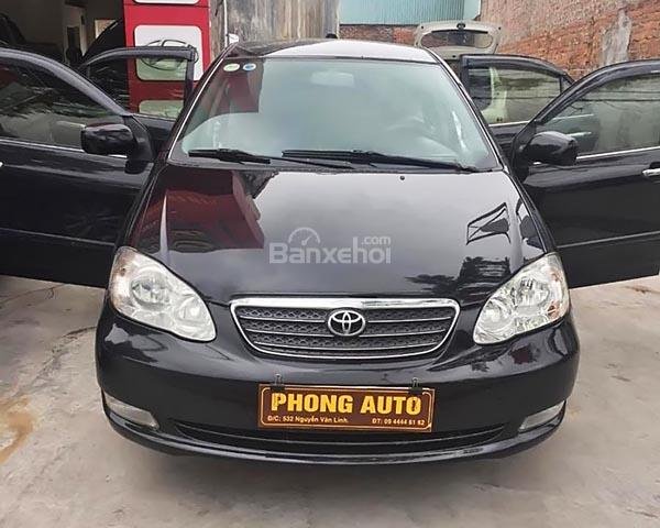 Bán Toyota Corolla Altis 1.8G MT đời 2004, màu đen số sàn