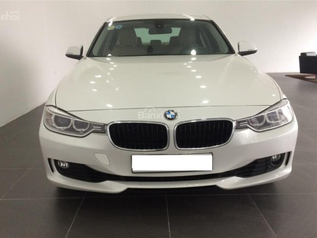 Bán xe BMW 320i đăng kí 2014, màu trắng, chính chủ, được bảo dưỡng định kì tại hãng