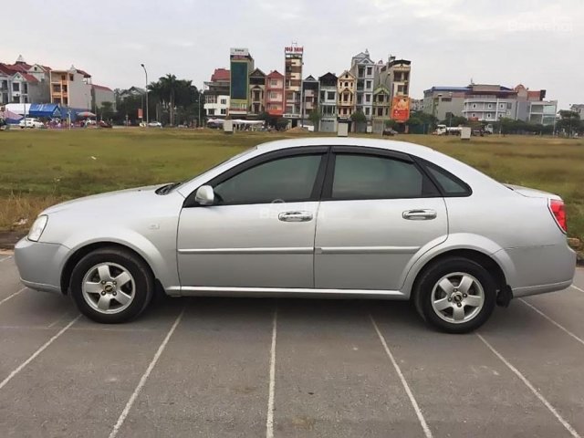 Cần bán gấp Daewoo Lacetti EX 1.6MT đời 2011, màu bạc như mới, 260tr