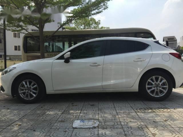 Cần bán xe Mazda 3 đời 2016, màu trắng đã đi 18000km