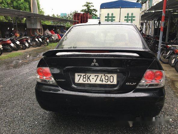 Bán Mitsubishi Lancer đời 2004, màu đen 