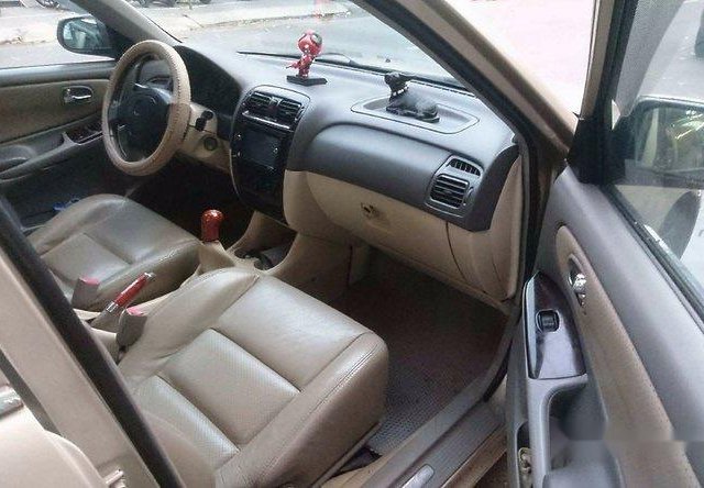 Cần bán gấp Mazda 626 năm 2002, màu bạc chính chủ, 215tr