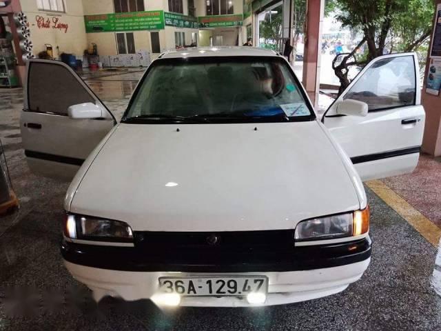 Cần bán lại xe Mazda 323 đời 1997, màu trắng, nhập khẩu nguyên chiếc chính chủ, 85 triệu