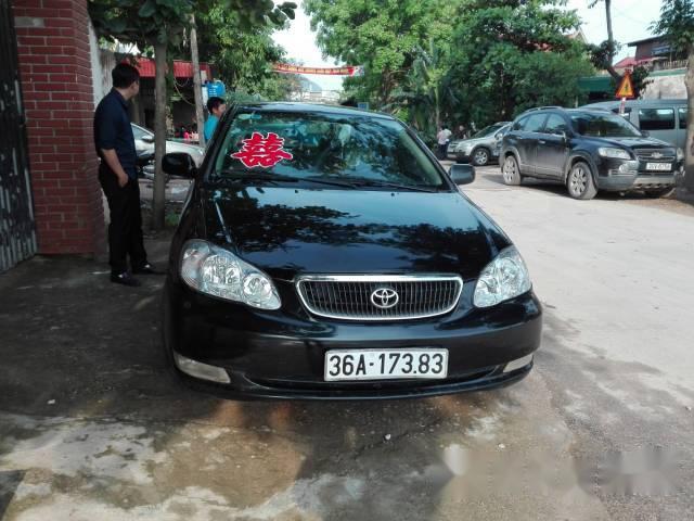 Bán Toyota Corolla altis 1.3 năm 2003, màu đen