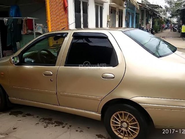 Cần bán xe Fiat Siena đời 2003, màu vàng số sàn, giá chỉ 85 triệu