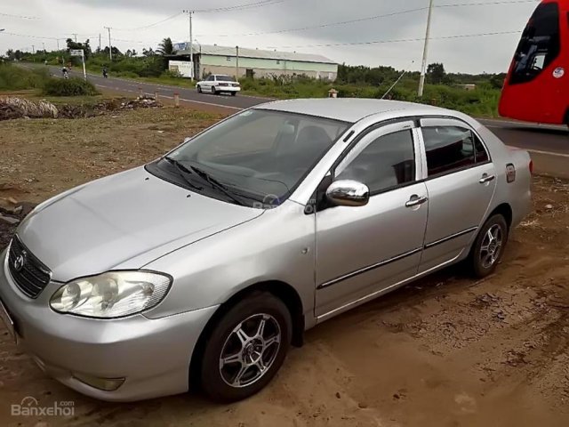 Cần bán gấp Toyota Corolla altis đời 2003, màu bạc chính chủ