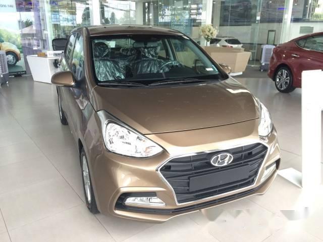 Cần bán xe Hyundai Grand i10 1.2 AT đời 2017, màu vàng cát  