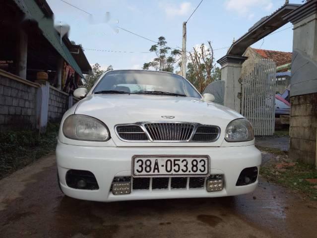 Cần bán gấp Daewoo Lanos đời 2004, màu trắng