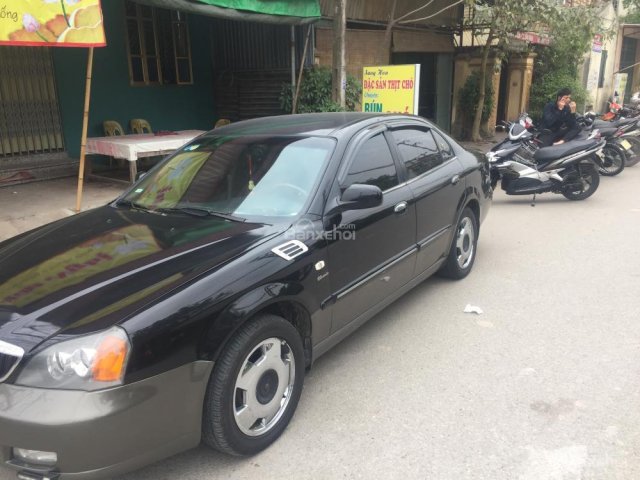 Cần bán lại xe Daewoo Magnus đời 2004, màu đen