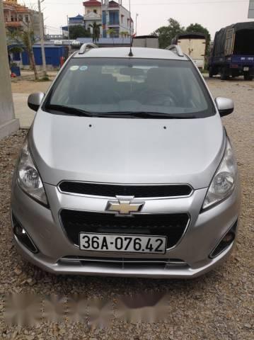 Cần bán Chevrolet Spark đời 2013, màu bạc