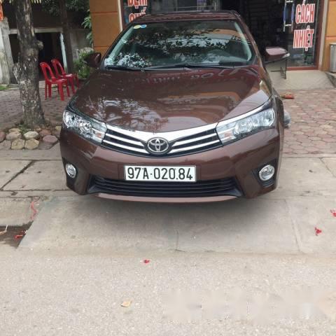 Chính chủ bán xe Toyota Corolla altis 1.8G đời 2016, màu nâu0