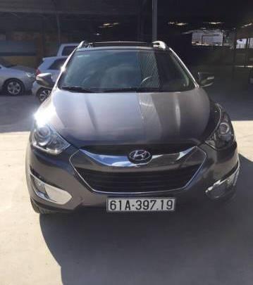 Cần bán lại xe Hyundai Tucson đời 2011, màu nâu, 558 triệu