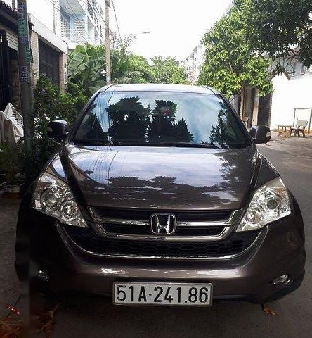 Cần bán gấp Honda CR V đời 2011, màu nâu chính chủ, 590 triệu