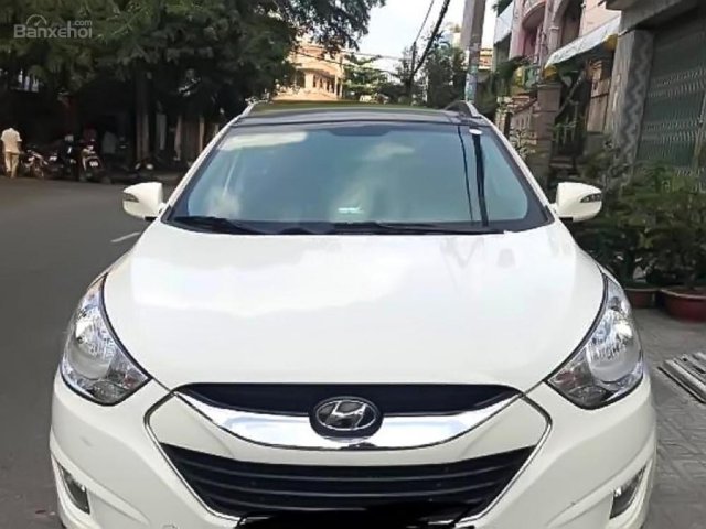 Bán xe Hyundai Tucson 2.0 AT 4WD đời 2012, màu trắng, nhập khẩu nguyên chiếc chính chủ, 606 triệu