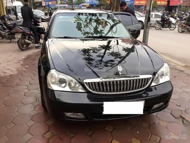 Cần bán gấp Daewoo Magnus đời 2004, màu đen số tự động