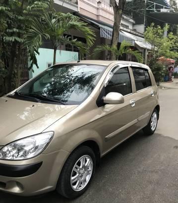 Bán xe Hyundai Getz 1.4 AT SX 2009, màu vàng