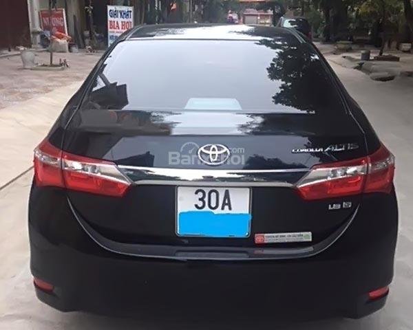 Bán xe Toyota Corolla altis đời 2014, màu đen 