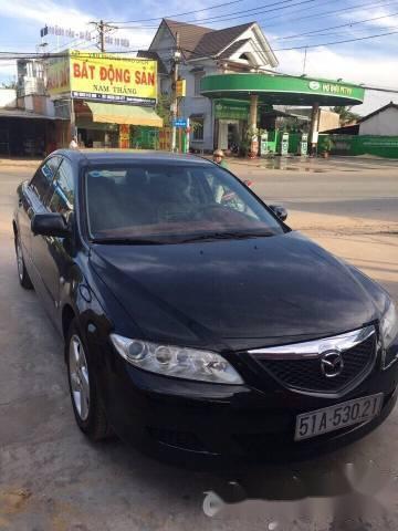 Cần bán Mazda 6 đời 2004, màu đen xe gia đình, giá 310tr