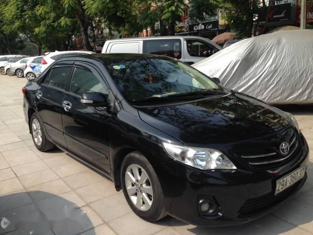 Bán Toyota Corolla altis đời 2011, màu đen xe gia đình, giá chỉ 570 triệu